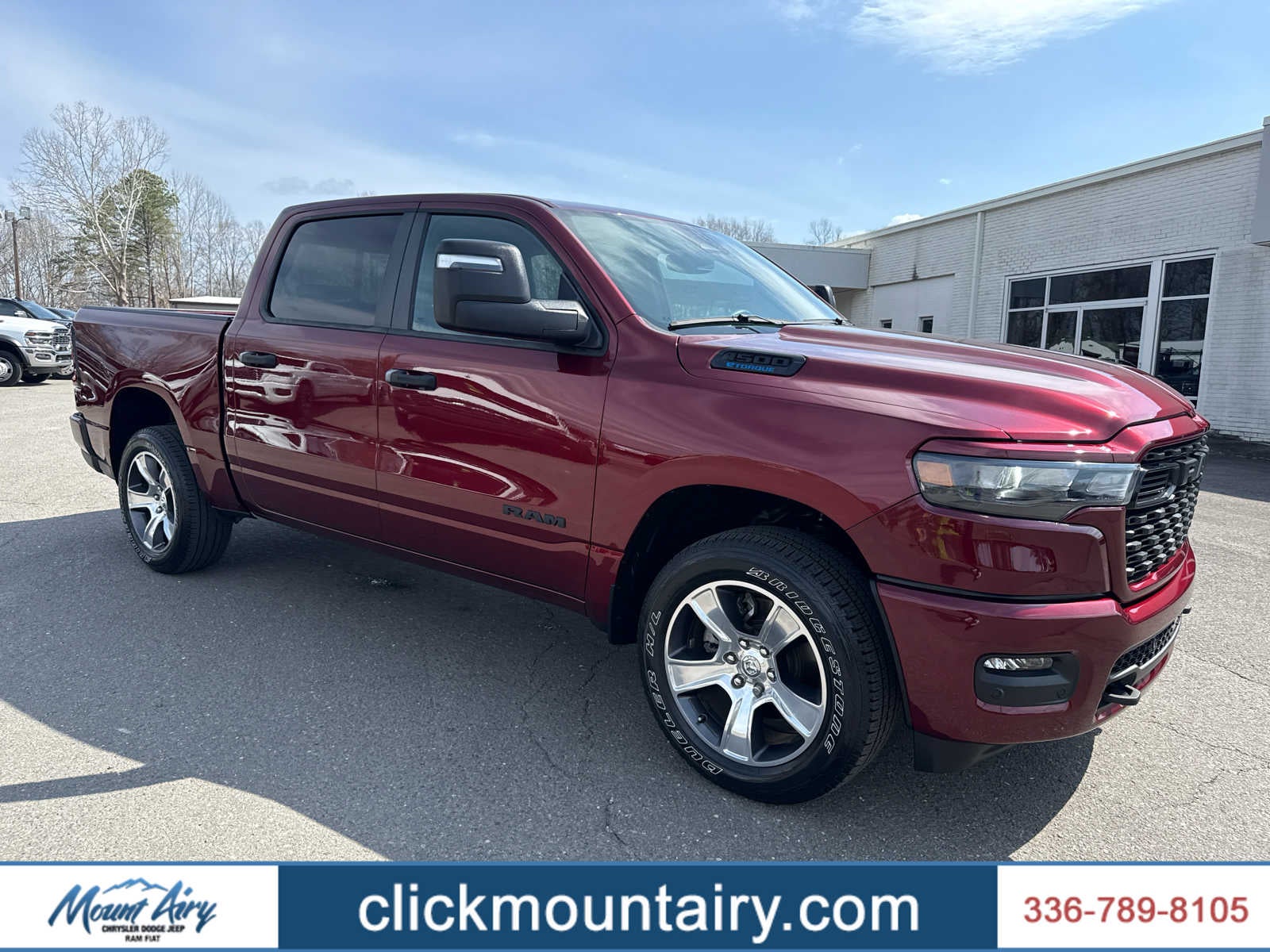 2025 RAM 1500 Tradesman Crew Cab 4x4 5'7' Box in Delmonico Red Pearlcoat — front three-quarter view