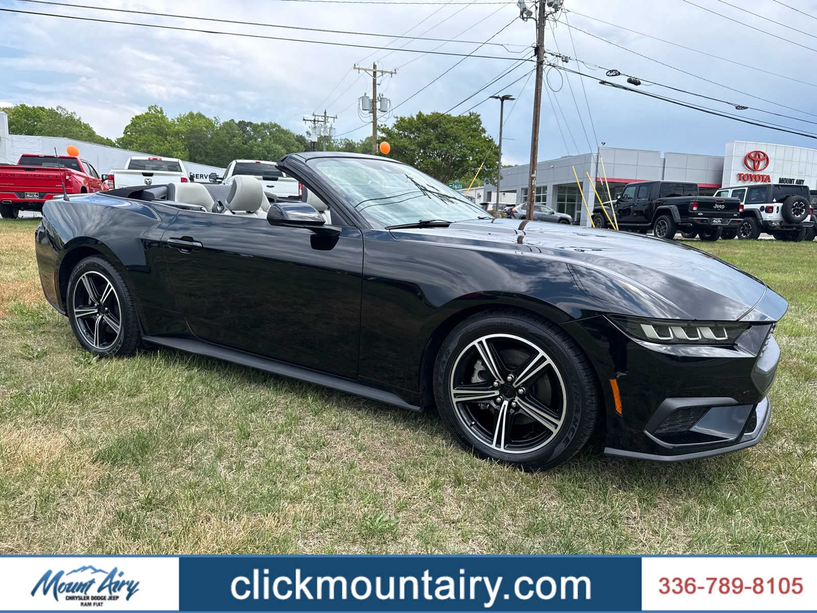 2024 Ford Mustang EcoBoost Premium Convertible in Shadow Black — front three-quarter view