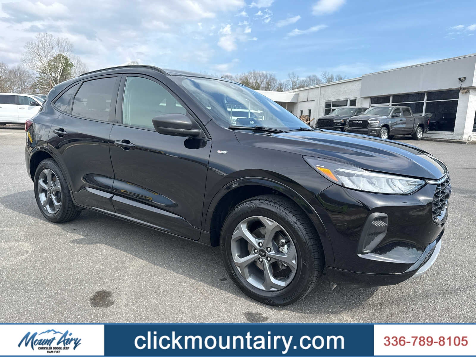2024 Ford Escape ST-Line in Agate Black — front three-quarter view
