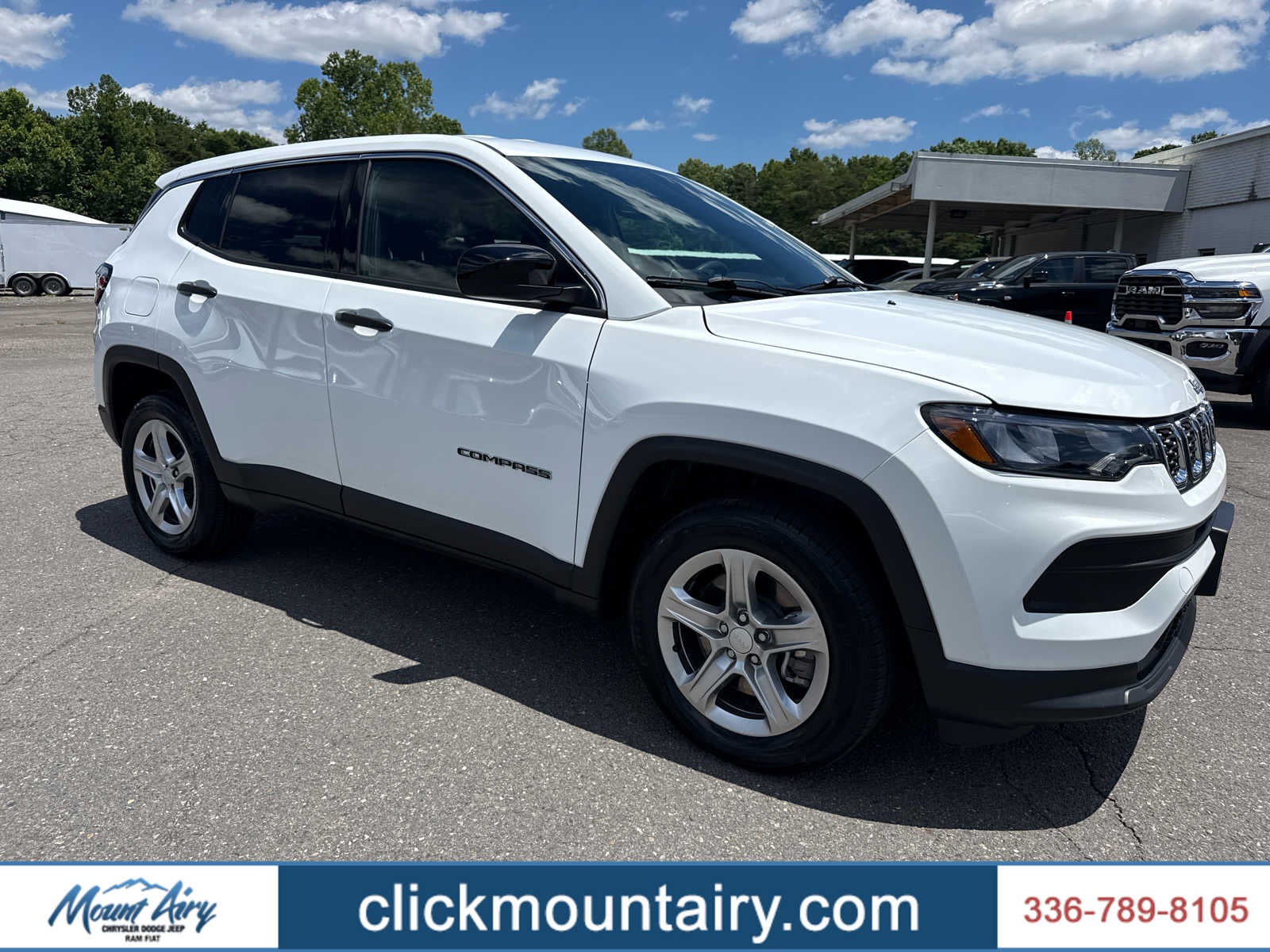 2024 Jeep Compass Sport 4x4 in Bright White Clearcoat — front three-quarter view