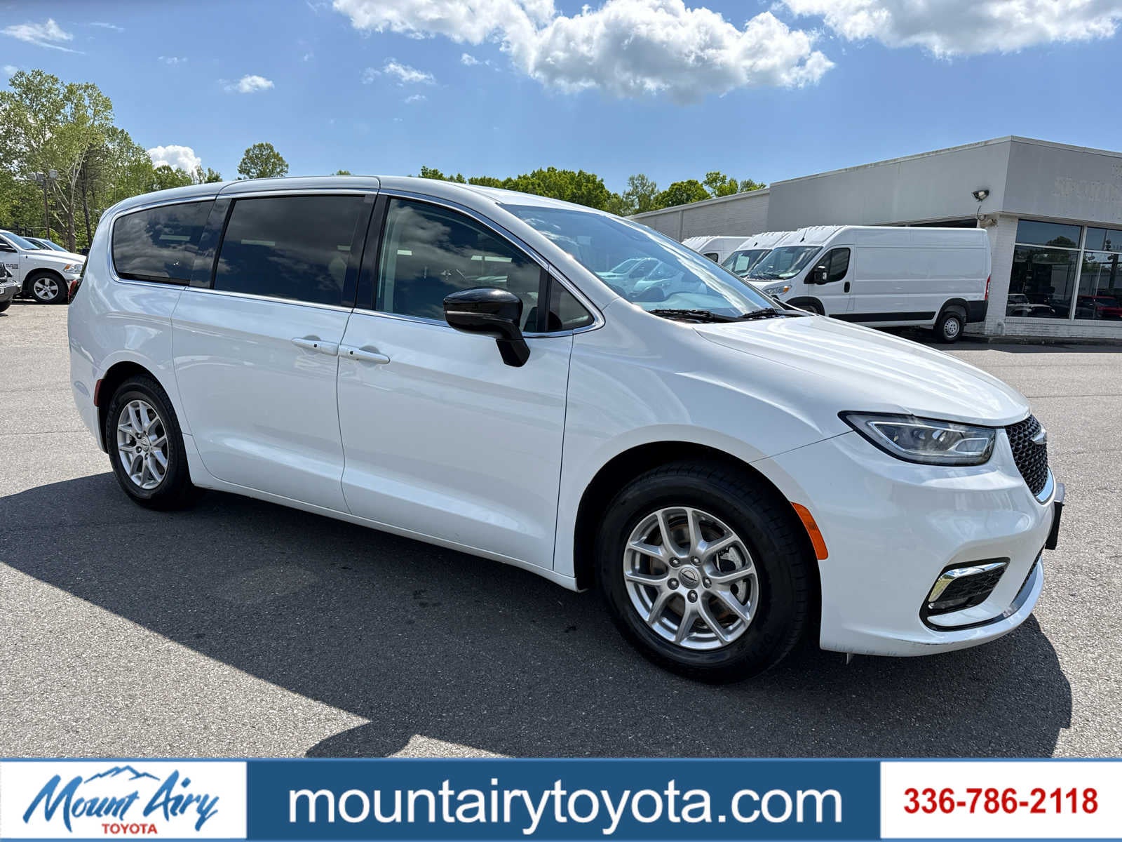 2024 Chrysler Pacifica Touring L in Bright White Clearcoat — front three-quarter view