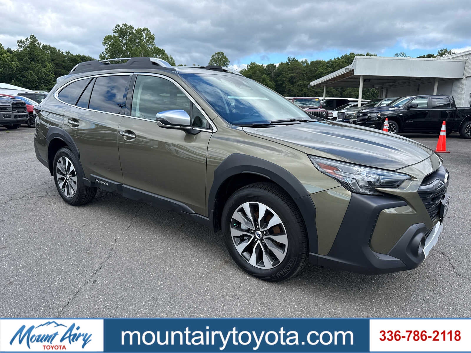 2025 Subaru Outback Touring XT in Autumn Green Metallic — front three-quarter view