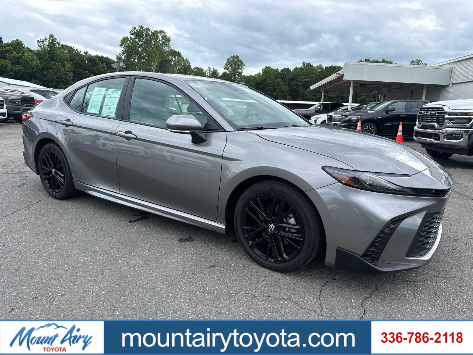 2025 Toyota Camry SE in Heavy Metal — front three-quarter view