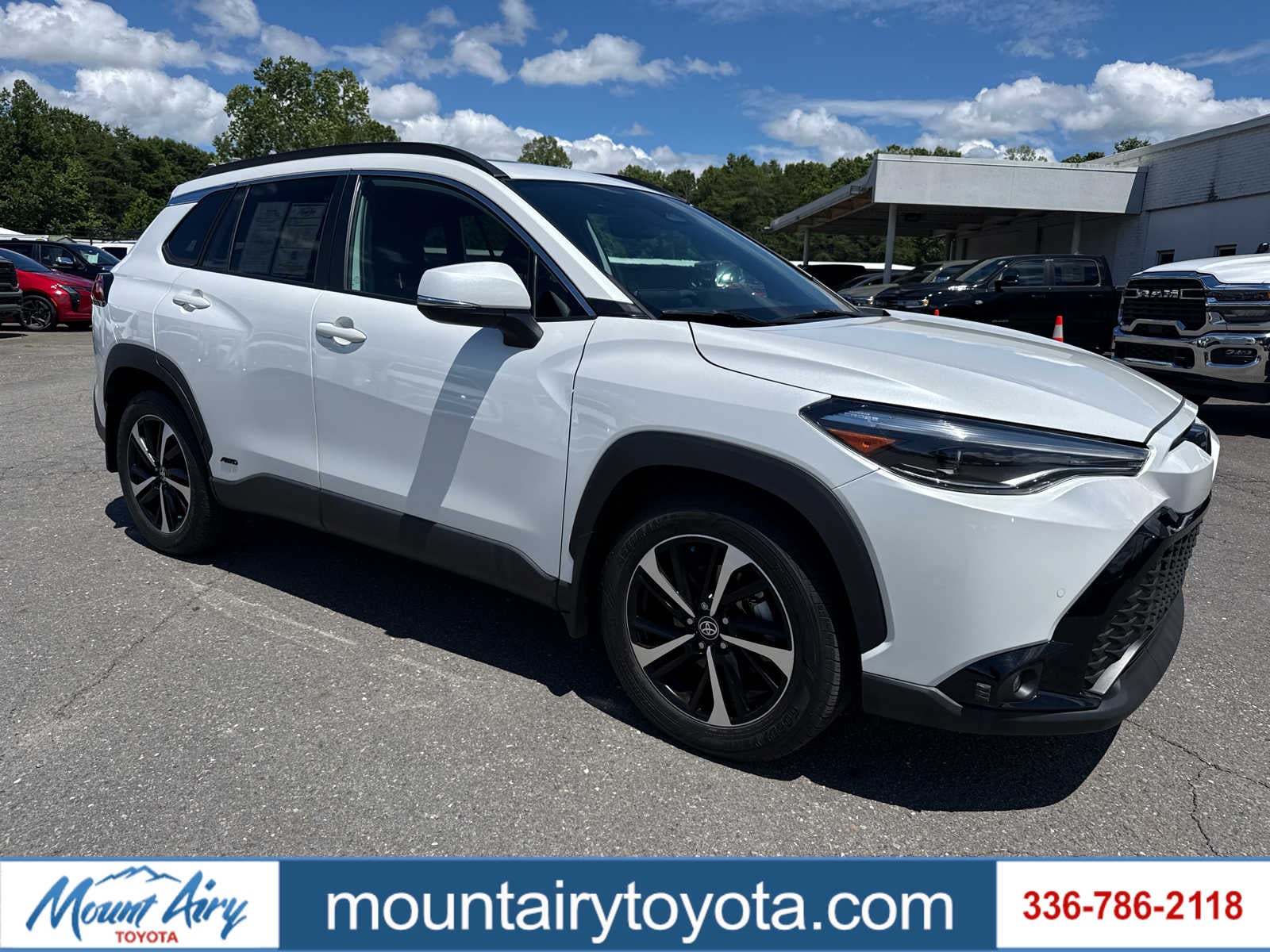 2024 Toyota Corolla Cross Hybrid XSE in Wind Chill Pearl — front three-quarter view
