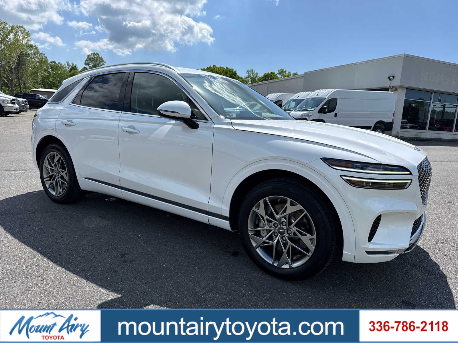 2025 Genesis GV70 2.5T in Uyuni White — front three-quarter view