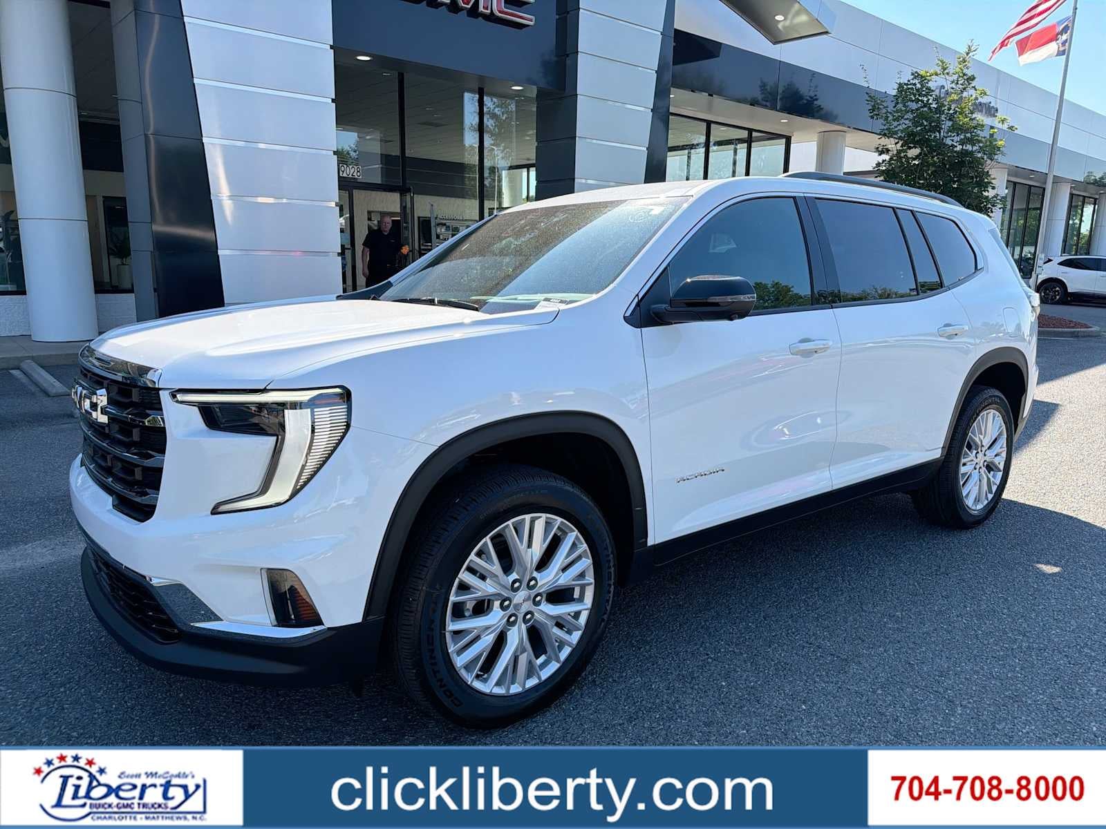 2026 GMC Acadia Elevation in Summit White — front three-quarter view