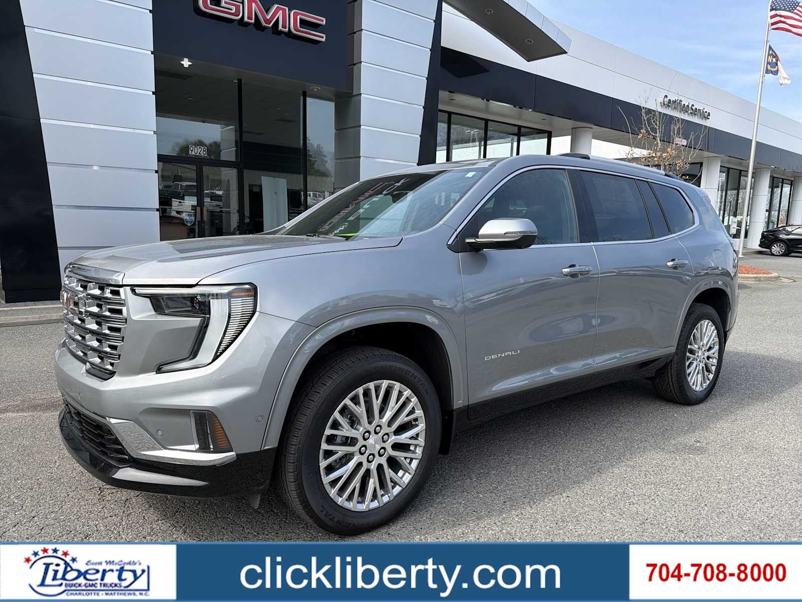 2026 GMC Acadia Denali in Sterling Metallic — front three-quarter view