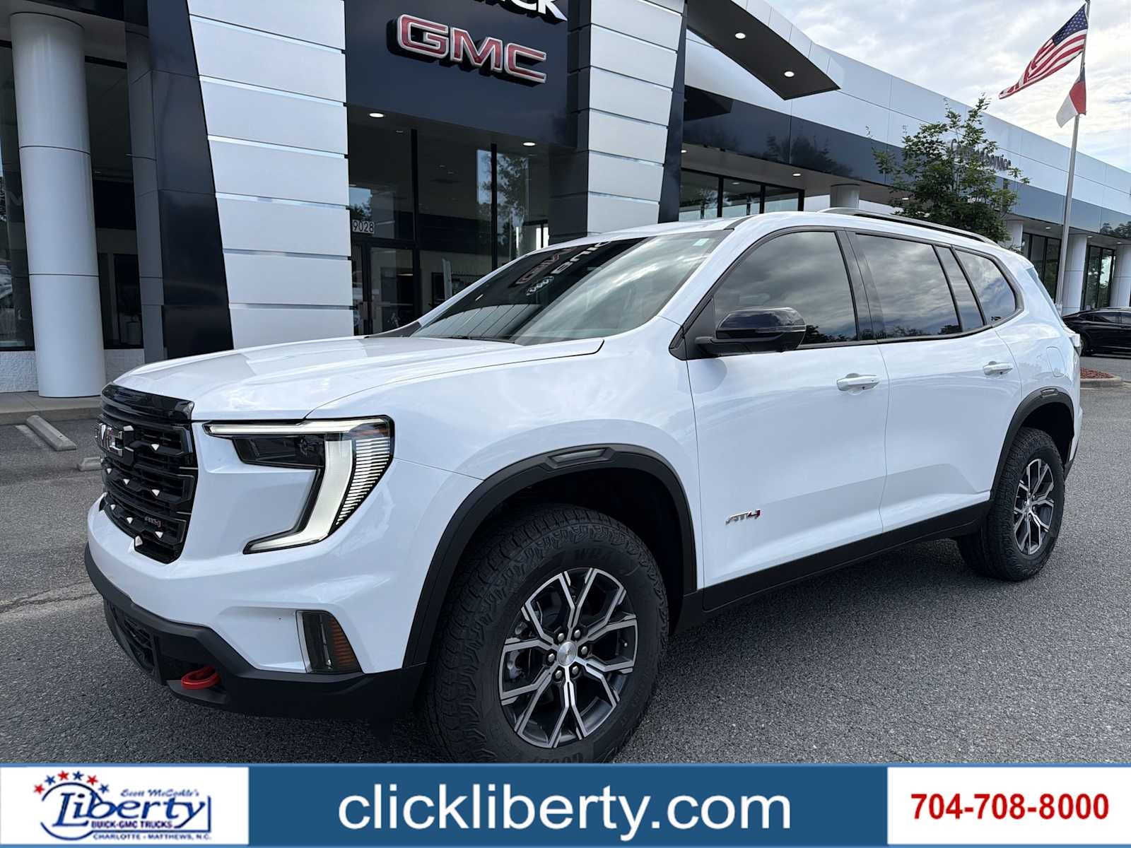 2026 GMC Acadia AT4 in Summit White — front three-quarter view