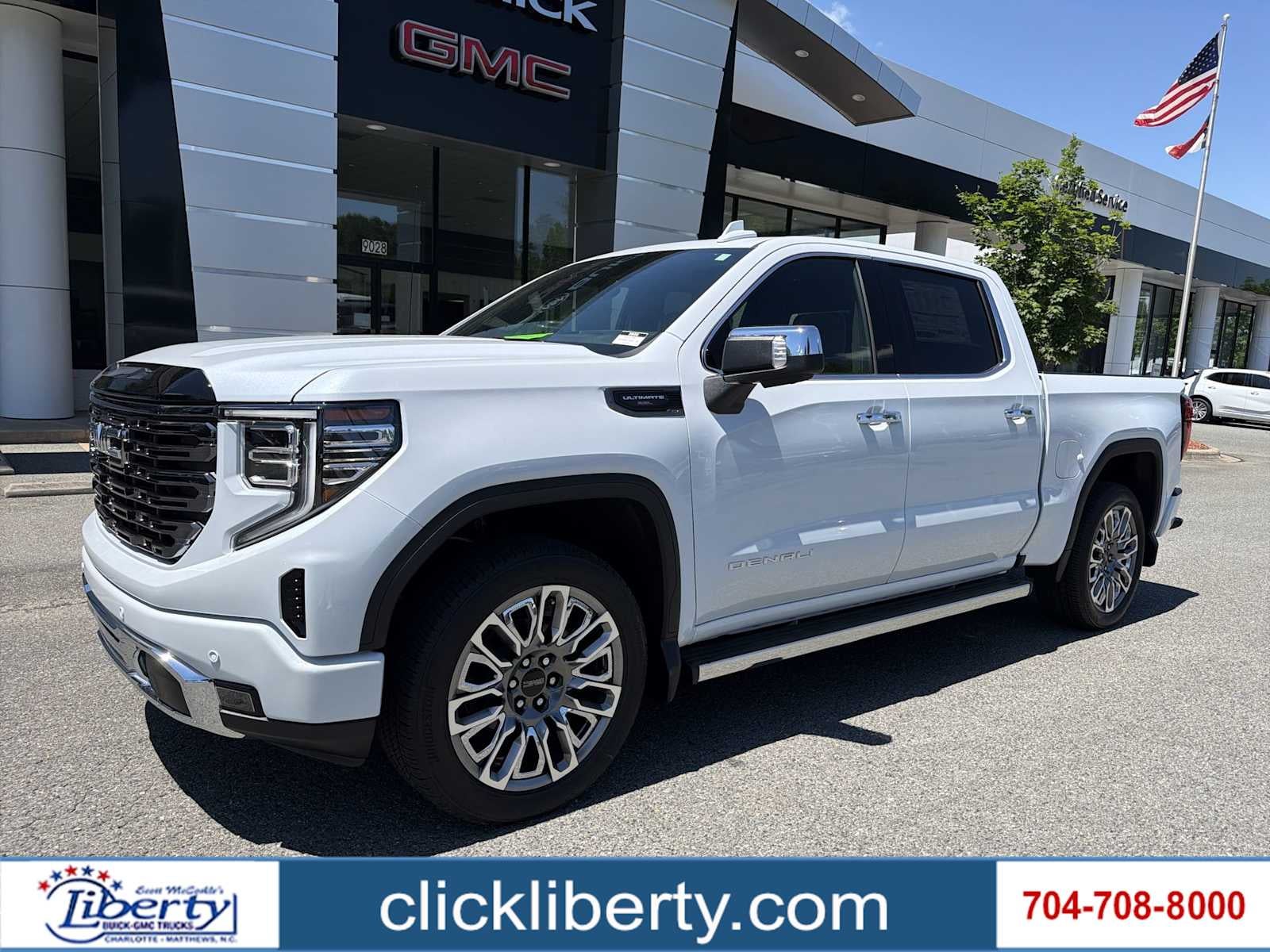 2026 GMC Sierra 1500 Denali Ultimate in Glacier White Tricoat — front three-quarter view