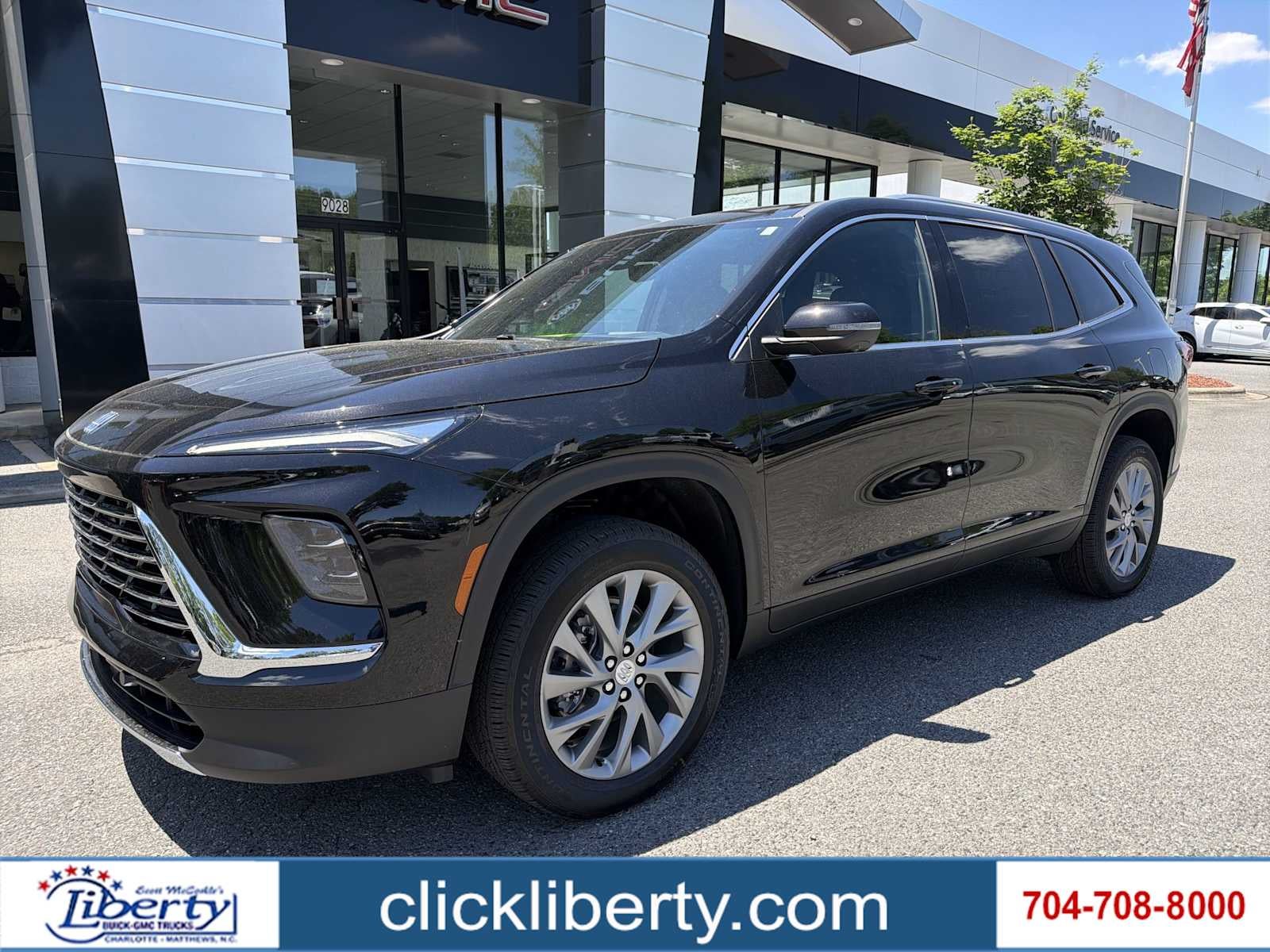 2026 Buick Enclave Preferred in Ebony Twilight Metallic — front three-quarter view