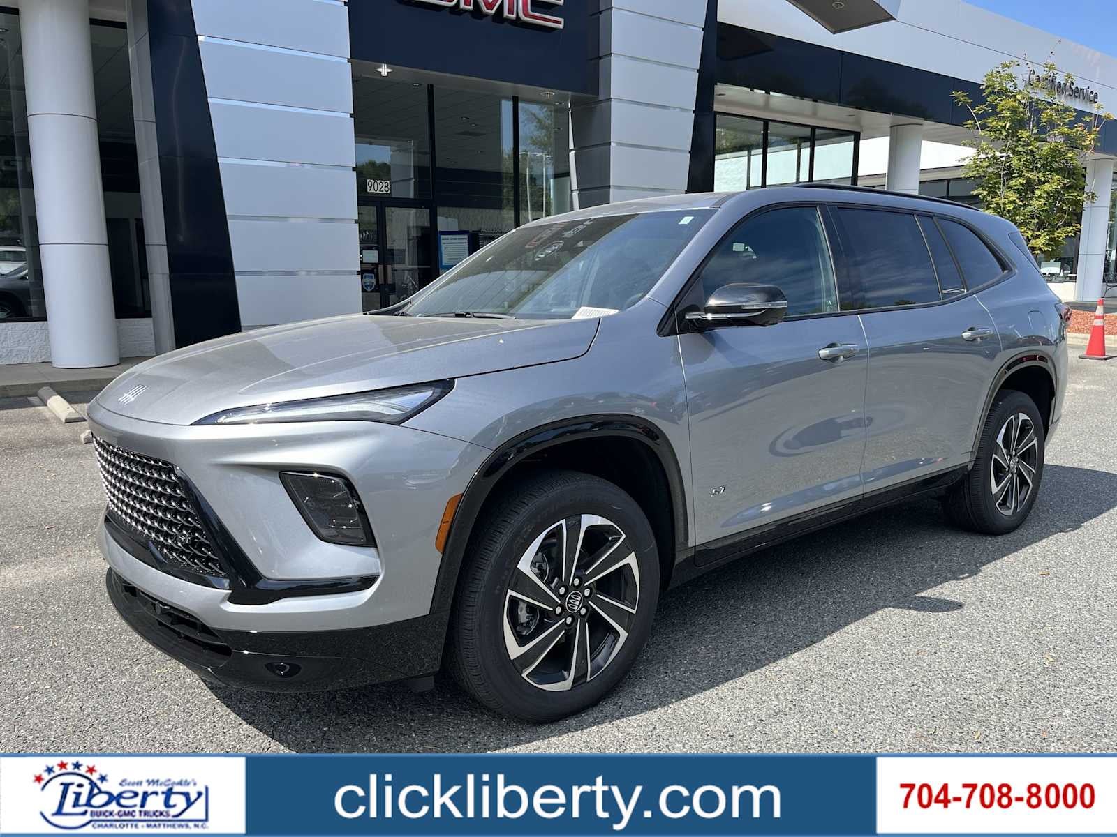 2026 Buick Enclave Sport Touring in Moonstone Gray Metallic — front three-quarter view