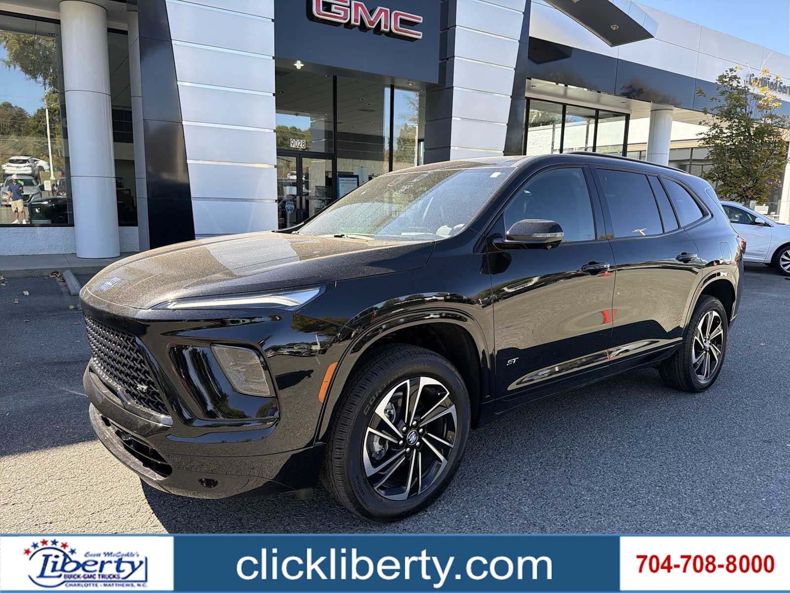 2026 Buick Enclave Sport Touring in Ebony Twilight Metallic — front three-quarter view