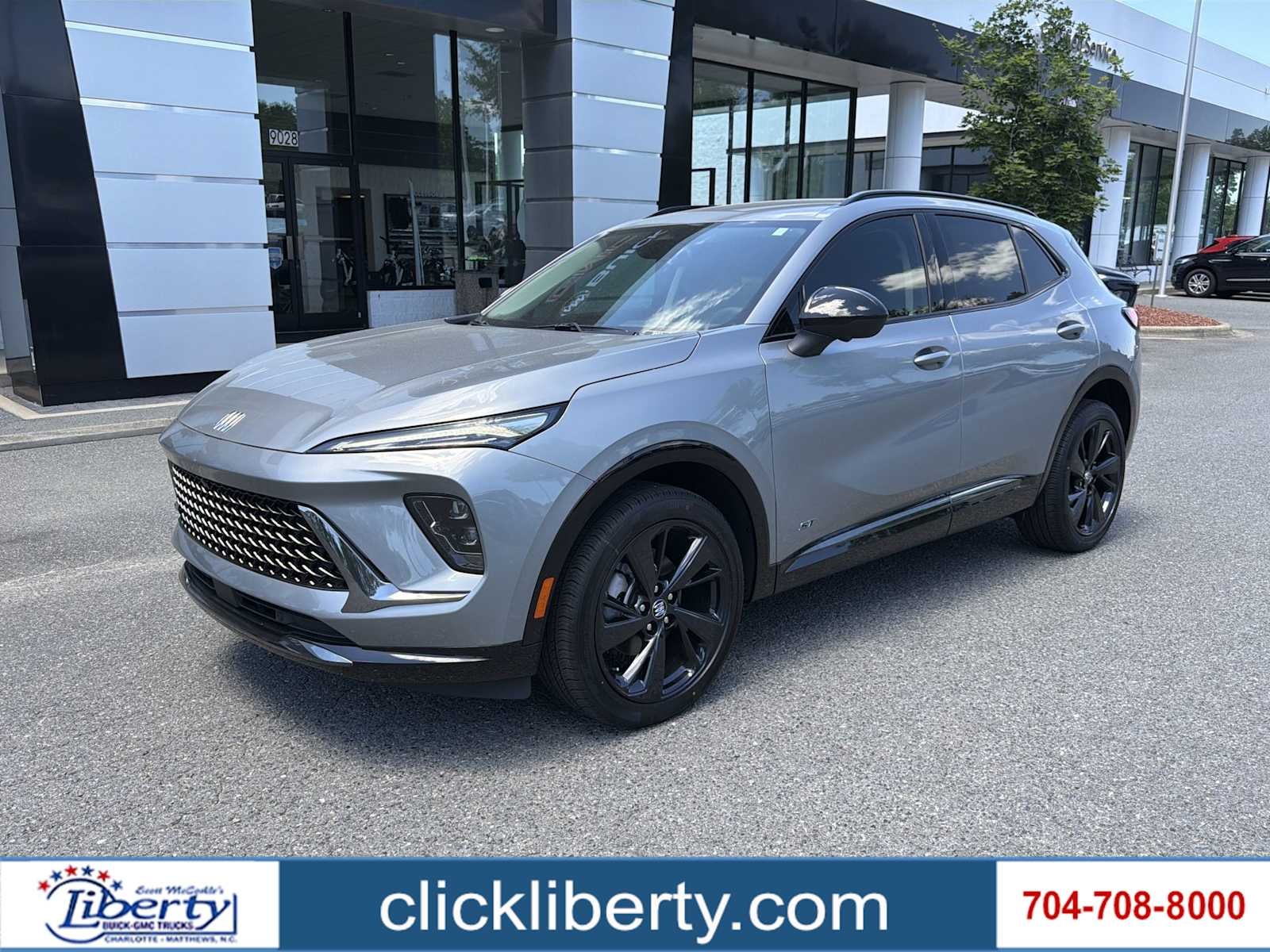 2026 Buick Envision Sport Touring in Moonstone Gray Metallic — front three-quarter view