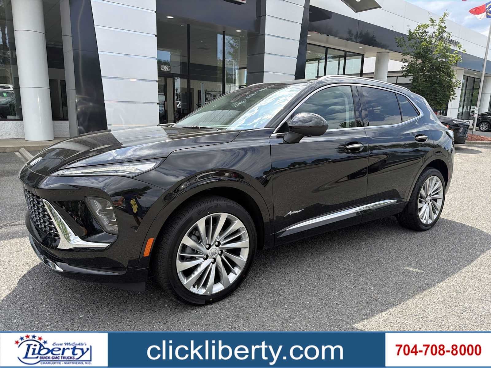 2026 Buick Envision Avenir in Ebony Twilight Metallic — front three-quarter view