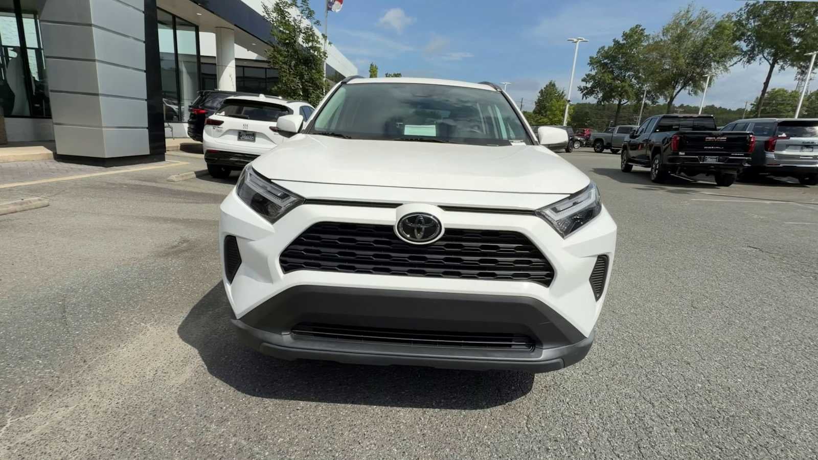 2025 Toyota RAV4 — rear three-quarter view