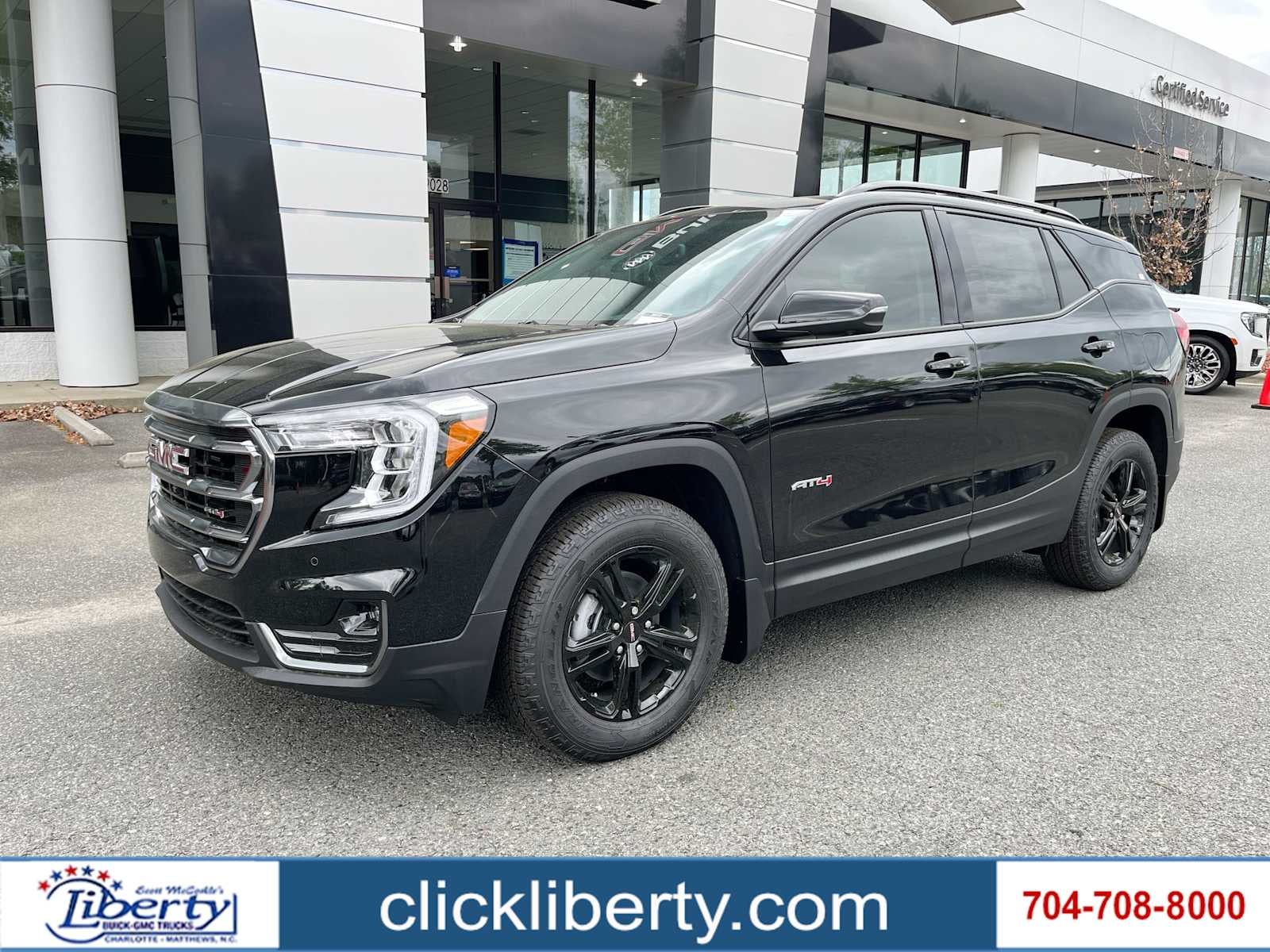 2024 GMC Terrain AT4 in Ebony Twilight Metallic — front three-quarter view