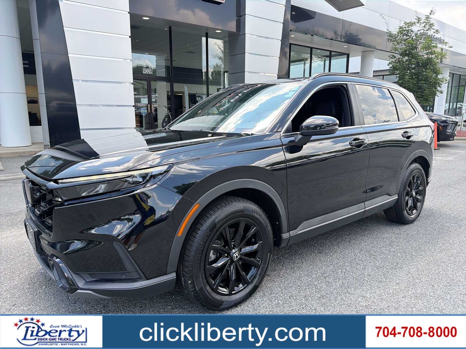 2024 Honda CR-V Hybrid Sport-L in Crystal Black Pearl — front three-quarter view